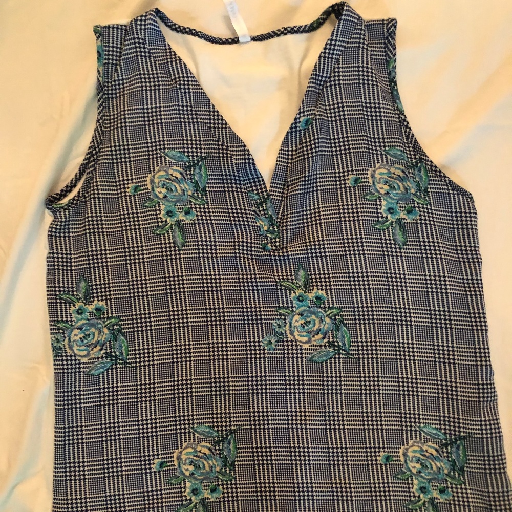 Sleeveless blouse floral stripes